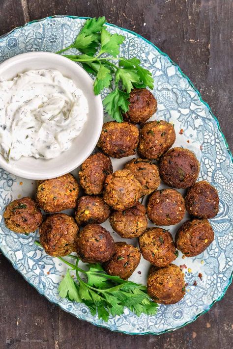 Easy Vegan Meatballs with Eggplant l The Mediterranean Dish Eggplant Meatballs, Crab Cake Recipes, Vegan Eggplant, Vegan Meatballs, Easy Mediterranean Diet Recipes, Roasted Eggplant, Delicious Appetizer Recipes, Vegetarian Entrees, Mediterranean Dishes