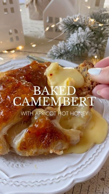 Leah Bergman • food & lifestyle on Instagram: "Baked Camembert Cheese in puff pastry with apricot hot honey. This appetizer is absolute heaven and so easy to make for Christmas or New Years Eve. Here’s what you’ll need: 🥂 BAKED CAMEMBERT 1 sheet puff pastry, thawed but still cold 1 round Camembert cheese 1 large egg, beaten 1/4 cup honey 1/4 cup apricot preserves 1 tbsp chili flakes, or less to taste Chopped pecans Turbinado sugar ✨ 1. In a sauce pan, combine apricot preserves, honey and chili flakes. Bring to a simmer stirring until mixture thickens a bit. Remove from heat. 2. Place puff pastry on a parchment lined baking sheet. Top with Camembert round. 3. Spoon hot apricot honey over the cheese and sprinkle with chopped pecans. 4. Fold pastry up over the cheese. 5. Brush with beate Feta And Honey Pastries, Baked Brie Recipes With Apricot Jam, Baked Brie With Apricot Jam, Baked Camembert Puff Pastry, Baked Brie In Puff Pastry Honey, Apricot Brie Puff Pastry, Apricot Preserves, Baked Camembert, Turbinado Sugar