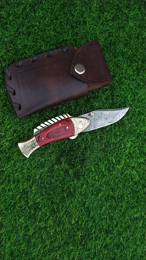 Custom Handmade Fish Folding Knife, Pocket knife, Best gift knife, Christmas gift knife, Wedding gift knife, Anniversary gift knife   Guarantee: We offer you a peace of mind and satisfying service. Quality assurance and customer satisfaction is our priority above everything. In any case if you are not satisfied with the products you can return them within 7 working days with absolute money back guarantee on receiving the product back in original condition. Courier / Shipping: Through DHL and DPD, fast and traceable. Payment is done according to the weight to Courier Company for all sorts of deliveries. So, the best discount is offered to you for shipping when you buy more than one product. Customer care: Our products are extremely sharp please use responsibly and always keep away from chil Case Knife, Unique Knife, Pretty Knives, Fish Knife, Damascus Steel Knife, Outdoor Knife, Knife Collection, Cool Knives, Service Quality