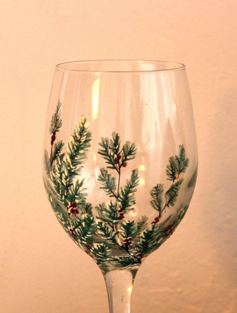 Snowy Boughs Hand Painted Wine Glass by NewHopeElizabeth on Etsy, $20.00 Christmas Glass Painted Vase, Painted Wine Glasses Animals, Winter Glass Painting, Christmas Wine Glass Ideas, Christmas Wine Glass Painting Ideas, Christmas Painted Glasses, Bottle Painting Christmas, Winter Wine Glass Painting, Christmas Glass Painting Ideas