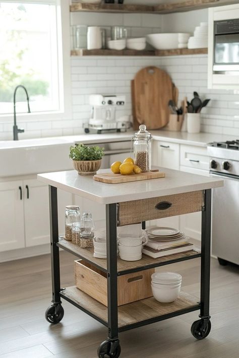 Small kitchen with a mobile island, wooden shelves, and white subway tile backsplash Kitchen Island Moveable, Kitchen Island In Small Space, Kitchen Islands On Wheels, Portable Kitchen Islands, Islands In Kitchen, Types Of Kitchen Islands, Moveable Kitchen Island, Moveable Island, Kitchen Island Base