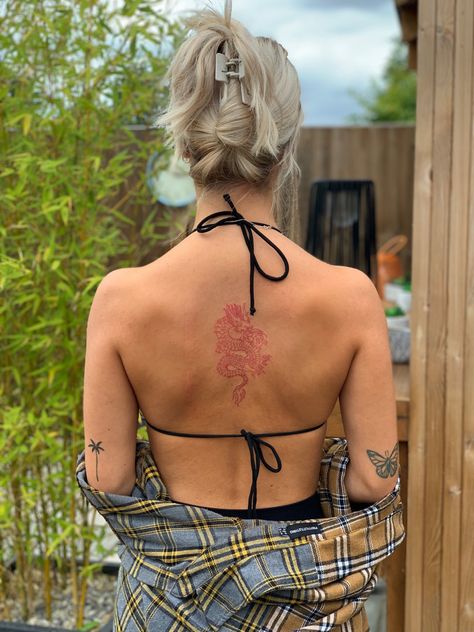 Red Ink Dragon Tattoo Back, Dragon Spine Tattoo For Women Dainty, Red Spinal Tattoo Women, Small Dragon Back Tattoo, Spine Tattoos Red Ink, Chinese Dragon Back Tattoo, Spine Tattoos For Women Dragon, Butterfly Patchwork Tattoo, Red Dragon Tattoo For Women