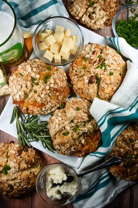 A recipe for the cutest loves of miniature soda bread, in three variations: Garlic, Asiago and Herb, Bleu Cheese and Olive, and Cheddar and Dill! Irish Soda Bread For Two, Cheddar And Chive Irish Soda Bread, Cheese And Herb Irish Soda Bread, Irish Soda Bread Food Network, Sally’s Baking Irish Soda Bread, Soda Bread Recipe, Bread Lame, Irish Soda Bread Recipe, Asiago Cheese