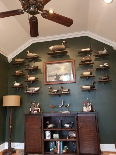 Our new look bourbon room Living Room Hunting Theme, Hunters Basement Man Cave, Decoy Duck Display, Decoy Duck Decor, Hunting Game Room Ideas, Hunting Theme House Decor, Duck Mount Decor, Hunting Decor Living Room Rustic, Hunting Game Room