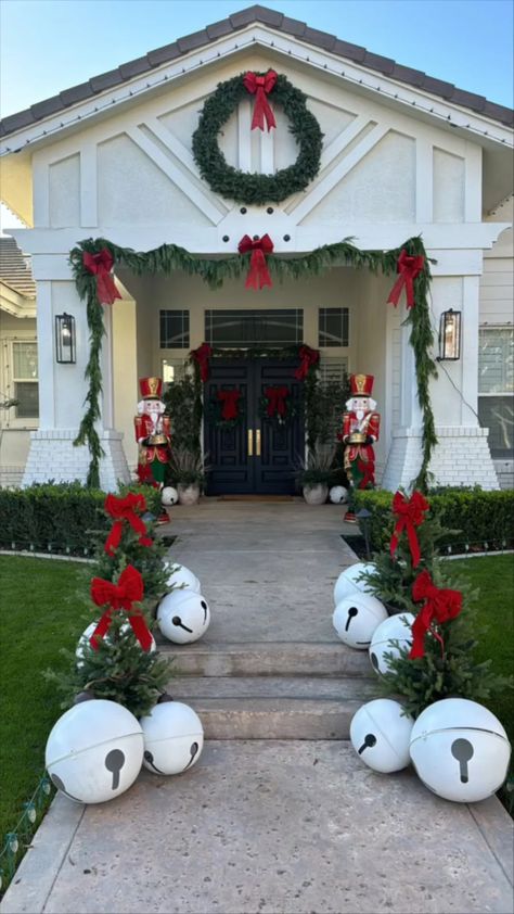 I love traditional outdoor Christmas decor & our oversized Christmas porch decor looks soo cute this year!  From the red bows to the giant nutcrackers, our outdoor christmas decorations are so festive & fun! Xmas House Decorations Outside, Valentines Outdoor Decor, Backyard Christmas Decor, Christmas Outside Decor, Front Yard Christmas Decorations Ideas, Oversized Christmas Decorations, Christmas Decor Outside, Christmas Outdoor Decor Ideas, Valentines Outdoor Decorations