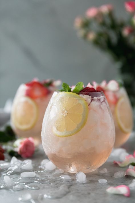 This Rosé Lemonade Elderflower Sangria is the most refreshing summer cocktail! It's super easy to make, only 5 ingredients, and is easily multiplied to serve a crowd! All you need is dry rosé, freshly squeezed lemon juice, a touch of simple syrup for sweetness, elderflower liquer, and a splash of seltzer. Absolutely delicious and dangerously good! #cocktail #rosé #sangria #summer Elderflower Sangria, Cocktail Rose, Rose Lemonade, Refreshing Summer Cocktails, Squeezed Lemon, Summer Cocktail, Summer Refreshments, Blue Hawaiian, Julia Child