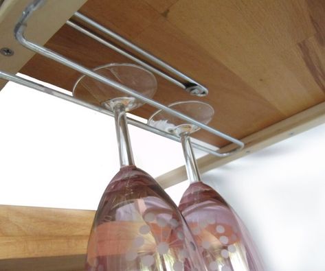 Hang necklaces from picture ledges and organize cleaning supplies in spice racks. Ikea Camping Hacks, Ikea Camping, Wine Rack Projects, Easy Closet, Mini Shelf, Wine Rack Design, Extendable Coffee Table, Hack Ikea, Malm Dresser