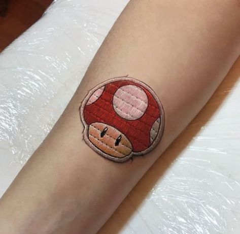 Patch Tattoo Anime, Embroidery Patches Tattoo, Minimalist Tattoo Cartoon, Mushroom Patch Tattoo, Embroidery Style Tattoo, Patch Style Tattoo, Patch Tattoo Style, Patch Tattoo Ideas, Embroidery Tattoo Ideas