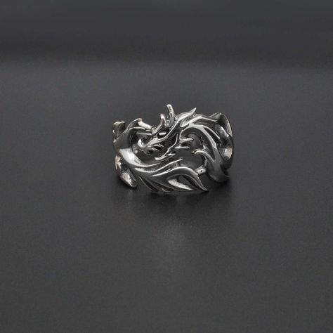 Dragon Silver Ring, Solid Silver Handmade Dragon Ring, Animal Theme Jewelry, Unisex Size 9 Description: This exquisite Dragon Silver Ring is a perfect blend of craftsmanship and style, designed for both men and women. Handmade from solid sterling silver, this unique dragon-themed ring showcases intricate detailing that captures the essence of the majestic dragon. Ideal for lovers of animal-themed jewelry, this unisex ring is both bold and elegant, making it a stunning statement piece for any occ Dragon Jewelry Rings, Majestic Dragon, Animal Themed Jewelry, Dragon Motif, Dragon Ring, Dragon Jewelry, Animal Rings, Silver Dragon, Silver Design