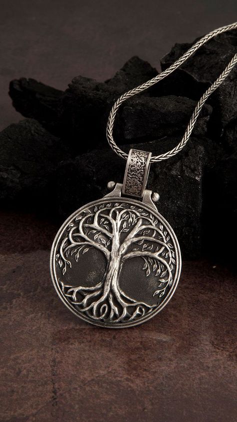 This 925 Sterling Silver necklace, with an aged finish, features stylish engraving details. Expertly made and intricately designed, SilverGates jewelry collection is presented in an array of contemporary and classic pieces. Made with carefully selected materials ★Item Details • Material: 925 Sterling Silver • Pendant weight: 13-14 grams • Bail Width : Suitable for up to 0.15 Inc (4.00 mm) Chain • Pendant Diameter: 3.5 cm x 3.5 cm • Chain Thickness: 1.5 mm Yggdrasil Necklace, Mens Cross Chain, Viking Man, Viking Men, Man Jewelry, Mens Crosses, Cross Chain, Tree Necklace, Men Jewelry