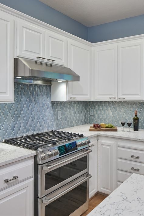 Blue Backsplash Grey Countertop, Kitchen With Light Blue Backsplash, Blue Backsplash For White Cabinets, Kitchen Blue Tile Backsplash, Blue Kitchen Backsplash With White Cabinets And White Countertops, Blue Backsplash White Cabinets, Blue And White Kitchen Tile Backsplash, White Kitchen Cabinets Blue Backsplash, White Cabinets With Blue Backsplash