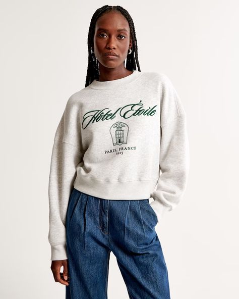 Women's Destination Crest Sunday Crew | Women's New Arrivals | Abercrombie.com Clothes Graphic Design, Paris Clothes, Clothes Graphic, Creative T Shirt Design, Paris Outfits, American Clothing, Club Shirts, Sporty And Rich, Comfy Sweatshirt