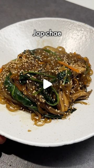 김 정호 on Instagram: "Korean Food Series : Japchae

Ingredients (Serves 3)
- 100g glass noodles
- 1/4 carrot
- 1/2 onion
- Mushrooms
- 100g spinach
- Sauce*

Sauce Ingredients
- 1 tablespoon minced garlic
- 3 tablespoons light soy sauce
- 1 tablespoon dark soy sauce (optional, for color)
- 1 tablespoon sugar
- 2 tablespoons corn syrup
- 1 tablespoon sesame oil
- sesame seeds(roasted)

Recipe
1. Soak the glass noodles in hot water for 30 minutes until smooth.
2. Put oil in a pan on high heat and stir-fry the carrots and onions for 1 minute.
3. Add the sauce and glass noodles to the pan.
4. Lower the heat to low and stir everything together for 5 minutes, allowing the sauce to absorb and the ingredients to combine well.
5. Taste and adjust the seasoning with more soy sauce or salt if needed, t Spinach Sauce, Instagram Korean, Dark Soy Sauce, Korean Recipes, Glass Noodles, Korean Dishes, Roast Recipes, The Sauce, Asian Cooking