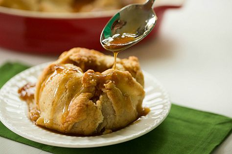 Apple Dumplings                                                                                         INGREDIENTS: For the Pastry: 3 cups all-purpose flour 1 teaspoon salt 1 cup vegetable shortening, chilled ⅓ cup ice water  For the Apples: 8 medium Granny Smith apples, peeled and cored 8 teaspoons unsalted butter 7 teaspoons granulated sugar 1½ teaspoons ground cinnamon  For the Sauce: 1½ cups light brown sugar 1 cup water ½ cup salted butter, cubed Winter Puddings, Steamed Puddings, Apple Dumplings Recipe, Apple Dumpling Recipe, Apple Dumpling, Brown Eyed Baker, Apple Dumplings, Dumplings Recipe, Dumpling Recipe