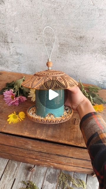 39K likes, 357 comments - cedarwoodceramics on March 29, 2023: "Stringing up the new bird feeders!! Bird houses too🪺🏡 We’ll be restocking the shop with lots of spring goods this Saturday! (April 1st at 5pm pacific)We’ll do a story preview on Friday and send out an email with all the details as well! 😊 #birdfeeder #handmadeceramics #wheelthrownpottery #ceramicart #gardenart #springart". Ceramic Bird Feeder Handmade, Pottery Birds Ideas, Pottery Bird Feeders Handmade, Ceramic Bird Feeder Pottery, Pottery Bird Feeder, Ceramic Bird Feeders, Pottery Bird Feeders, Ceramic Bird Feeder, Pottery Handmade