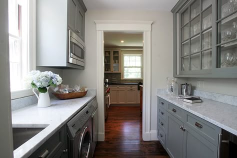 Originally designed as a transition space between the Kitchen and Dining Room used for silver storage and meal service, today’s Butler’s Pantry can serve multiple functions. Description from hundredacredesign.wordpress.com. I searched for this on bing.com/images Butlers Pantry And Mud Room Combo, Mid Century Modern Butlers Pantry, Laundry In Butlers Pantry, Kitchen To Laundry Room Transition, Laundry Room And Butlers Pantry Combo, Butlers Pantry And Laundry Room Combo, Combined Laundry And Pantry, Laundry And Butlers Pantry Combined, Mudroom Butlers Pantry Combo