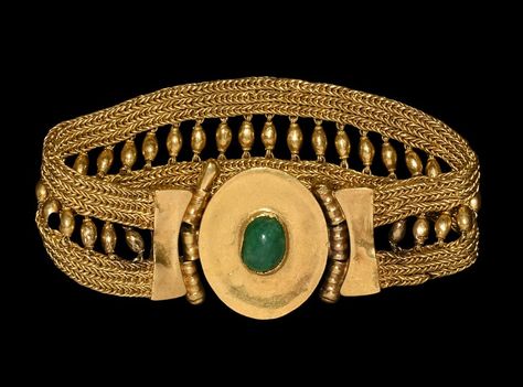 Roman Gold and Emerald Bracelet, 1st Century AD A hollow-formed discoid plaque with a later added central cabochon emerald. 16cm overall Emeralds were among the gemstones known to the Ptolemaic... Ancient Roman Jewelry, Byzantine Gold, Gold And Emerald, Byzantine Jewelry, Ancient Jewels, Emerald Cabochon, Roman Jewelry, Ancient Jewellery, Emerald Bracelet