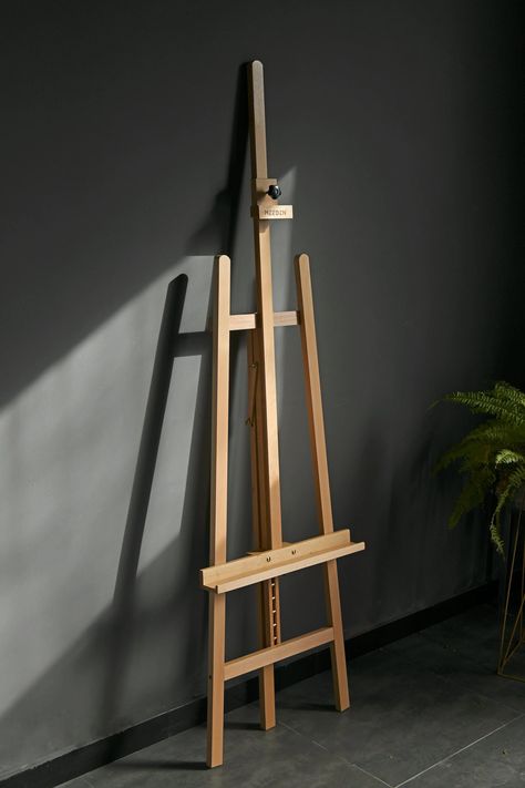 Size & flexibility. Extra large Lyre style studio A-frame wooden easel which could be adjusted from 68.9" to 88.2" in height. Different from the classic one, the canvas stand can hold canvas up to 49.6". According to the needs of different customers, we designed the overall angle adjustment and the canvas part adjustment. You can adjust the rear leg and upper knob to reach the angles you want. Quality & Stability. This art easel stand is made of strong beech wood with metal accessories, which is Diy Wood Easel Stand, Easel Aesthetic, Easel Diy, Easel Drawing, Canvas Stand, Diy Easel, Painting Easel, Floor Easel, Floor Painting