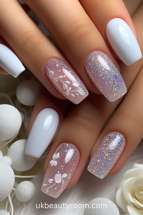 Glitter nail designs add sparkle and glamour to your manicure. They come in various forms, including ombré glitter, French tips with glitter accents, and glittery stars or snowflakes. This post contains 31 beautiful nail art designs with glitter to help you find your bling! Acrylics, short, almond, sparkle, simple, summer, coffin, square, red, pink, white, blue, silver, black and, gold, spring, winter, fall, summer, square, oval, round, squoval, gel nails, rhinestones, dip nails, natural nails. Squoval Gel Nails, Nail Art Designs With Glitter, Gel Nails Rhinestones, Summer Nails Neutral, Silver Accent Nails, Acrylics Short, French Tips With Glitter, Ombré French, Shower Nails