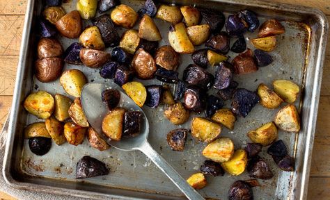 Rainbow Potato Roast - Each different type of potato here has its own distinctive flavor and texture as well as color. Some will roast more quickly than others but it doesn’t matter to me if certain pieces in the mix become very soft. My favorite mix here consists of sweet potato, purple potatoes, fingerlings, Yukon golds and red bliss. Rainbow Potatoes, Vegetarian Thanksgiving Recipes, Potatoes Recipes, Types Of Potatoes, Roasted Potato Recipes, Vegetarian Thanksgiving, Purple Potatoes, Nyt Cooking, How To Cook Potatoes