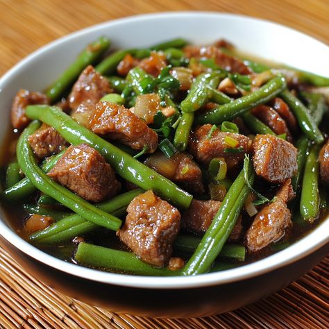 🌱 Adobong Sitaw (String Beans Adobo): A Filipino classic with a twist! 🍲 #FilipinoFood #VegetarianRecipe Adobong Sitaw (String Beans Adobo) Ingredients: String beans (1 lb, cut into 2-inch pieces) Soy sauce (1/4 cup) Vinegar (1/4 cup) Garlic (4 cloves, minced) Onion (1, chopped) Oil (2 tbsp) Water (1/2 cup) Salt and pepper (to taste) Instructions: Heat oil in a pan and sauté garlic and onion until fragrant. Add string beans and cook for 2 minutes. Pour in soy sauce, vinegar, and water. Si... Adobo Ingredients, Sitaw Recipe, Laing Recipe, String Beans, Instagram Recipes, Twisted Recipes, String Bean, Fair Food, Vinegar And Water