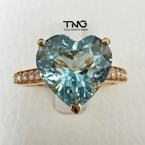 The first Heart Shape Aquamarine Ring is GIA-certified 2.76 carats set with halo & side natural diamonds in 18K Yellow Gold! . . . #thainativegems #heartshapering #18K #heartshapeaquamarine #heartshaped #aquamarine #aquamarinering #gemstonering #gems #gemstones Heart Shaped Rings, Aquamarine Ring, Aqua Marine, Aquamarine Rings, Color Ring, Heart Shape, Aquamarine, Natural Diamonds, Halo