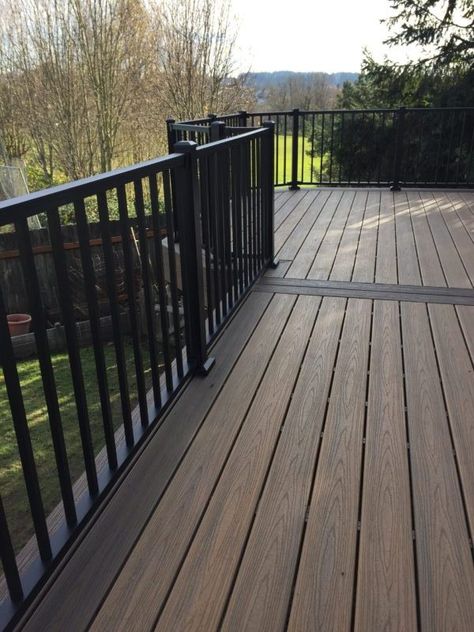 Brown Trex Deck With Black Railing, Trex Deck Ideas Covered Patios, Gray Trex Deck With Black Railing, Trek Deck Ideas Front Porch, Brown Deck With Black Railings, Black Trex Deck, Black Covered Deck, Pnw Deck Ideas, Brown Deck Black Railing