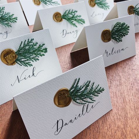 Wax Seal With Greenery, Holiday Table Name Cards, Name Card With Wax Seal, Christmas Cards With Wax Seal, Place Cards Wedding Wax Seal, Wax Seal Place Cards Weddings, Christmas Wedding Name Cards, Wax Seal Name Cards Wedding, Winter Wedding Name Place Cards