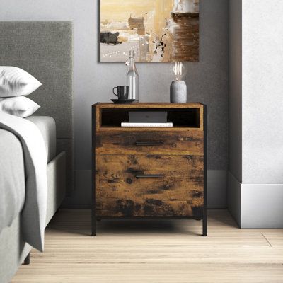 Stunning and classy, this nightstand makes a striking addition to any master or guest bedroom. Made of sturdy and dark solid wood that gives the piece a uniquely transitional flair, it features two drawers and one open compartment to hold bedtime essentials conveniently and within arms reach. Check out our Chadley collection for matching pieces. | Trent Austin Design® Chadley 23 Inch Rustic Wood Nightstand, 2 Drawers, Brown & Black Wood / Metal in Black / Brown | 23 H x 20 W x 16 D in | Wayfair Mid Century Modern Bedside Table, Drawer Bedside Table, Wood Bedside Table, Austin Design, Night Table, Wood Nightstand, Cozy Room, Industrial Chic, Monterey