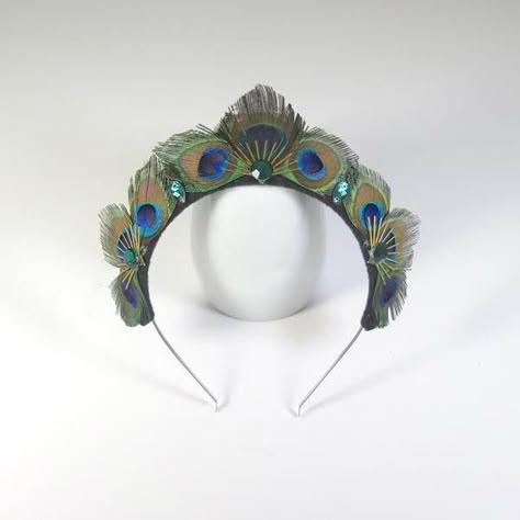 Make a statement with this peacock tiara headpiece handmade by Loschy Designs. Materials: cardboard, gems, peacock feathers, and fabris. Comfortable and lightweight ---- One size fits most Peacock Accessories, Peacock Costume, Peacock Jewelry, Tiara Headpieces, Peacock Decor, Peacock Art, Peacock Wedding, Feather Crafts, Theme Halloween