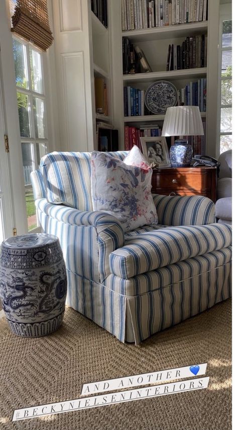 Blue Wingback Chair Living Room, Coastal Cosy Living Room, East Coast Interior Design, Maximalist Coastal Traditional, Grandmillennial Living Room, Living Room Ottoman Coffee Table, Nancy Myers Homes, Coastal New England Home, Traditional Eclectic Decor