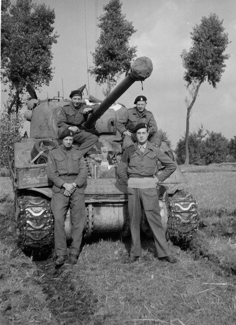 Members of 'B' Squadron, 3rd/4th County of London Yeomanry (Sharpshooters) pose next to Sherman Firefly tank | Online Collection | National Army Museum, London Sherman Firefly, Patton Tank, Military Photography, American Tank, Soviet Tank, Warrior 1, Sherman Tank, German Tanks, Battle Tank