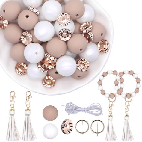 PRICES MAY VARY. 【61PCS Silicone Bead Keychain Making Kit】:You will receive 28 15mm silicone beads, 28 10mm rhinestone spacer beads, 2 tassels, 2 keychain metal rings and 2-meter long elastic rope.Beads hole size is about 2mm, Easy to thread，Can be made into 2 silicone key ring bracelet. 【High Quality Silicone Beads】:These silicone beads for jewelry bracelets making kit are made of high quality silicone, soft and smooth, no seams, uniform holes, durable and sturdy, won’t be worn or fade, odorles Silicone Bead Ideas, Heishi Jewelry, Silicone Bead Keychain, Key Ring Bracelet, Classy Rooms, Jewelry Keychain, Rubber Bead, Bracelets Making, Keychain Making