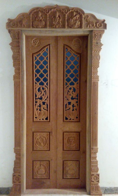 pooja door carving Pooja Room Door Carving Designs, Pooja Doors Modern, Pooja Room Wooden Single Door Design, Pooja Room Wood Carving Designs, Pooja Double Door Design, Puja Room Door Design Wood, Wooden Pooja Door Design, Teak Wood Pooja Door Design, Pooja Door Design Indian Homes