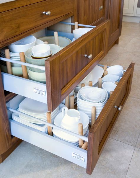 How can you arrange your dishes in a practical and effective way when you have a small kitchen? Follow our tips and tricks to maximize your available space. A suitable small kitchen storage asks fo… Dish Drawers, Clever Kitchen Storage, Kitchen Cabinet Drawers, Dish Storage, Kitchen Must Haves, Low Cabinet, Kitchen Drawers, Kitchen Photos, Kitchen Paint