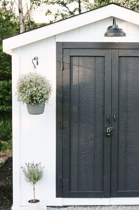 Modern Farmhouse Shed Reveal | house of hire Shed Remodel Exterior, All Black Shed, 2 Sheds Side By Side, Backyard Shed Decor, Olive Green Garden Shed, Shed Inspo Exterior, Outdoor Shed Lighting, Update Shed Exterior, Backyard Shed Makeover