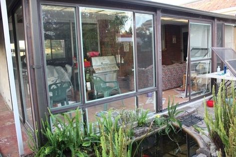 Our Budget Sunroom Makeover - & How to Spray Paint Aluminium Windows - House Nerd House With Aluminium Windows, Old Sunroom Makeover, Metal Sunroom Makeover, Sunroom Makeover Before After, 70s Homes, Painting Metal Doors, Sunroom Makeover, Windows House, Sunroom Remodel