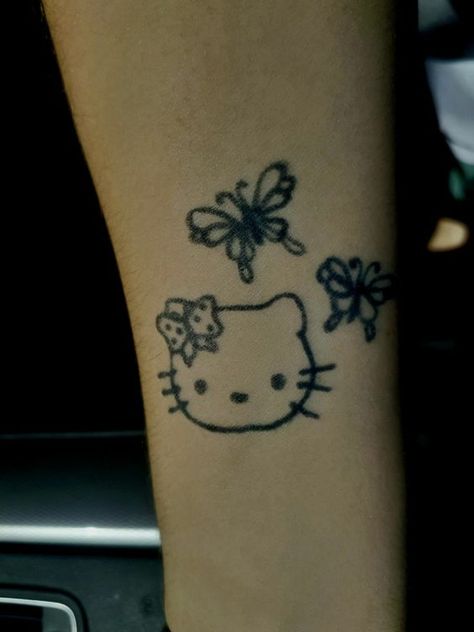 Hello kitty tattoo Hello Kitty Henna Tattoo, Hello Kitty Henna Design, Henna Designs Hello Kitty, Henna Hello Kitty, Henna Designs Y2k, Hello Kitty Henna, Y2k Henna, Rblx Characters, Mehendi Designs For Kids