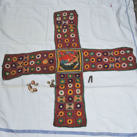 Chopat Game Design, Indian Games Traditional, Festive Folk Traditional Wear With Woven Motifs, Ceremonial Embroidered Fabric With Traditional Motifs, Tapatan Game Board, Traditional Board Games, Four Arms, Kings Game, Elegant Embroidery