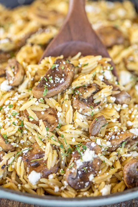 Mushroom & Feta Orzo - a super simple side dish that packs a ton of flavor! Ready to eat in about 20 minutes. Orzo, mushrooms, butter, garlic, chicken broth, and feta cheese. Garnish with dried parsley. Can add leftover chicken, pork, or beef for an easy main dish. #pasta #mushrooms #feta #sidedish Orzo Recipes Side, Butter Garlic Chicken, Feta Orzo, Mushroom Orzo, Teriyaki Pork Tenderloin, Orzo Pasta Recipes, Easy Main Dishes, Orzo Recipes, Dried Parsley