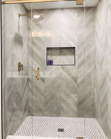 Mission Stone & Tile on Instagram: “We can’t get enough of this amazing shower by @aleciamariana. The bathroom walls covered in Mate Chevron | Terra Grigio looks…” Herringbone Marble Bathroom Wall, Showers With Black Floor, Shower With Herringbone Tile, Chevron Shower Tile, Bathroom Gold Hardware, Room Tiles Design, Chevron Bathroom, Laundry Room Tile, Bathroom Shower Walls