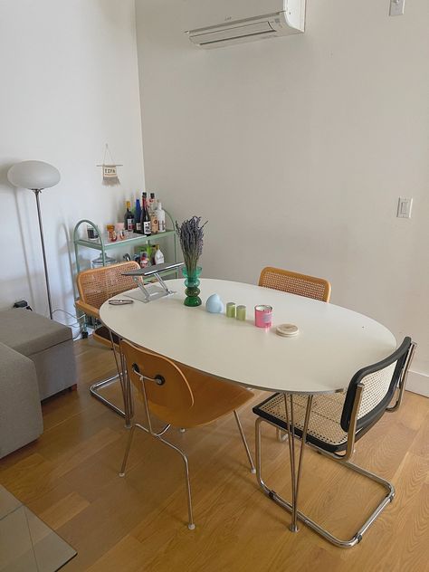 Nyc apartment Fritz Hansen Dining Table with cesca chairs and eames DCM chair, mcm, 70s, vintage table, mid century modern Retro Dinner Tables, Dinner Table Apartment, Mismatch Chairs Dining Table, Mcm Dinner Table, Mismatched Chairs Dining Table, Apartment Kitchen Table Ideas, 70s Dining Table, Cesca Chair Dining Room, 70s Interior Design Mid Century Modern