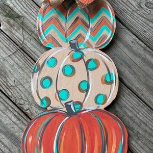 Snowman Door Hanger, Pumpkin Decorating Contest, Dollar Tree Pumpkins, Snowman Door, Pumpkin Door Hanger, Pumpkin Door, Fall Door Hangers, Wooden Pumpkins, Stacked Pumpkins