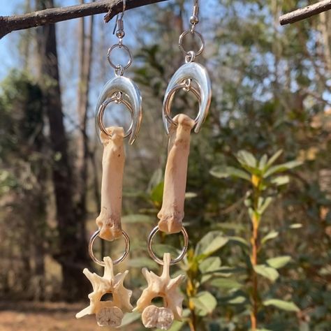 Ethically sourced - Real Coyote Foot Bone & Possum Vertebrae Crescent Moon Earrings. Available for sale on Poshmark and Mercari, under "itsthatgirll15". #goth #gothic #gothicstyle #gothicfashion #gothfashion #punkstyle #festivalfashion #grungestyle #grungefashion #poshmarkseller #poshmark #mercari #mercariseller #taxidermy #taxidermist #vultureculture #bones #oddities #oddity #animalbone #animalbones #animalbonejewelry #vulturecultureart #vultureculturejewelry #postapocalyptic #avantgarde #w... Animal Bone Earrings, Animal Bone Jewelry, Aesthetic Crafts, Vulture Culture, Bone Crafts, Bone Earrings, Bone Jewelry, Crescent Moon Earrings, Animal Bones