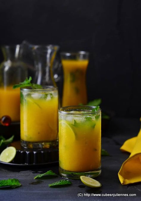 Refreshingly cool, sweet, Mango-Ginger Virgin Mojito! Every sip of this drink will trigger your palate with dash of lemon, freshness of mint, goodness of honey and ginger and last but not least…the natural  flavor and sweetness of our main hero of the drink ‘MANGO’. So, here is recipe of Mango-Ginger Virgin Mojito for you all! #drinks #recipes #summerdrinks #virgindrinks Blue Punch Recipe, Mojito Bar, Virgin Drinks, Mango Drinks, Mango Mojito, Virgin Mojito, Popular Cocktails, Mojito Recipe, Rum Cocktails