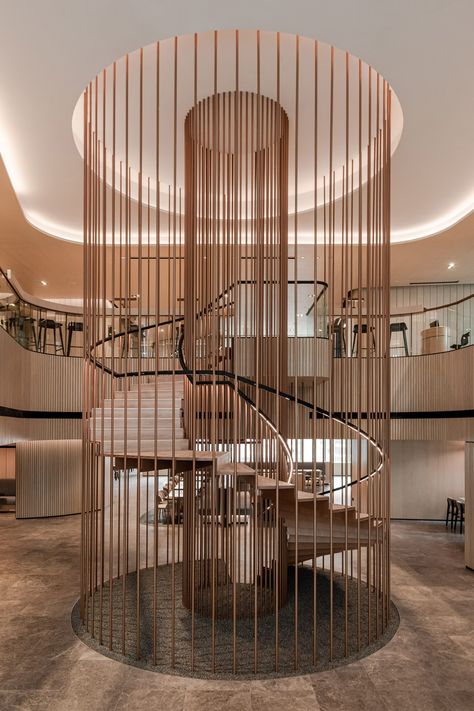 The staircase by Ministry of Design inside YTL Headquarters in Kuala Lumpur Brown Leather Chairs, Shared Office Space, Construction Firm, Shared Office, Booth Seating, Function Room, Spiral Stairs, Spiral Staircase, 3d Warehouse