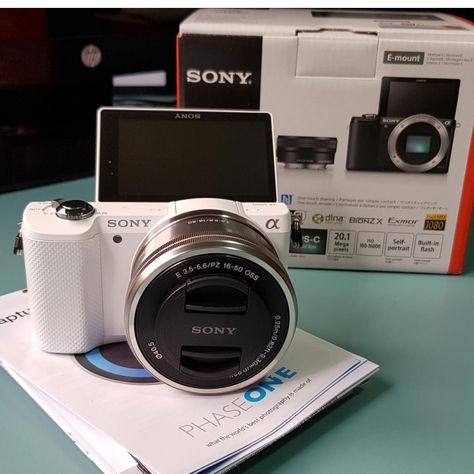 Beautiful Brand New Sony A5000 for sale - Perfect for those who need a light camera that functions like a mini-DSLR with interchangeable lens (Singapore only). https://sg.carousell.com/p/sony-a5000-e-mount-camera-with-aps-c-sensor-brand-new-in-beautiful-white-157342759/?ref=search&ref_query=Sony%20A5000&ref_referrer=%2Fsearch%2Fproducts%2F%3Fquery%3DSony%2520A5000&ref_reqId=37zfUjwSfwZdl4rb5NDz9pI7nM5fDm3y White Camera, Light Camera, Sony Camera, Mini Camera, Singapore, Technology, Brand New, Disney, Electronic Products