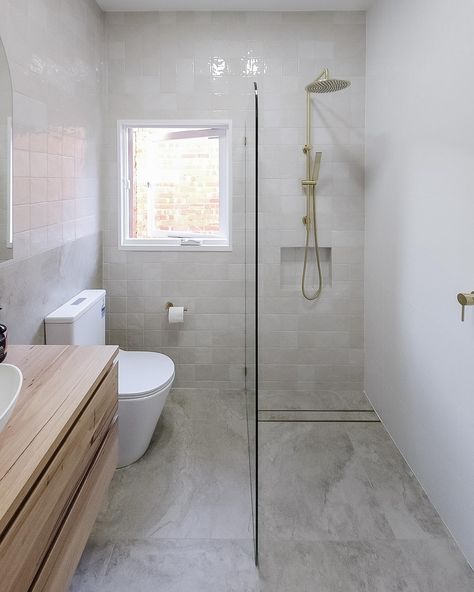 @adelaidebathroomprojects have done it again ❤️ Check out this Warm Coastal bathroom using our Newport bone mixed in gloss and Byron travertine look in ivory. I love this combo with the brushed brass taps. Full Bathroom Ideas, Small Full Bathroom Ideas, Brass Taps, Small Full Bathroom, Coastal Bathroom, Brass Tap, Coastal Bathrooms, Matte Material, Grey Tiles