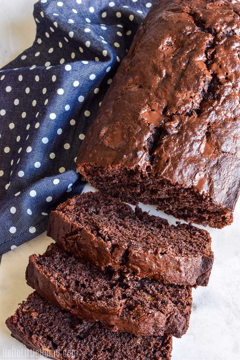 Are you a Chocolate Lover? Then you have to try this scrumptious Chocolate Banana Bread Recipe! Learn how to make the BEST Double Chocolate Banana Bread using simple ingredients. This delicious Chocolate Quick Bread is super moist, easy to make, and the loaf is loaded with two kinds of chocolate: cocoa powder and lots of dark Chocolate Chips / Chocolate Chunks. If you’re looking for best way to use up Leftover or Overripe Bananas, you’ll LOVE this Banana Chocolate Bread! | Hello Little Home Best Chocolate Banana Bread, Chocolate Quick Bread, Double Chocolate Banana Bread Recipe, Cocoa Bread, Double Chocolate Banana Bread, Chocolate Banana Bread Recipe, Chocolate Bread, Overripe Bananas, Chocolate Banana Bread