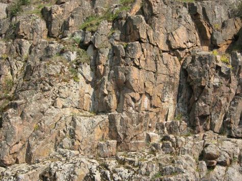 Rock cliff texture in brown and grey tones consisting of jagged, crumbling rock. Cliff Texture, Mountain Texture, Rock Cliff, Cliff Face, Rock Texture, Game Textures, Hybrid Art, Rock Textures, Model Train Scenery